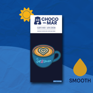 Choco Del Mar 'Cleo's Kick' chocolate bar featuring 63% cocoa, crafted with coffee and cream. Stylized packaging with a latte art illustration in a teal mug reading 'Cat & Cloud'. Icons in the background indicate the bar is smooth. There's also a sun icon.